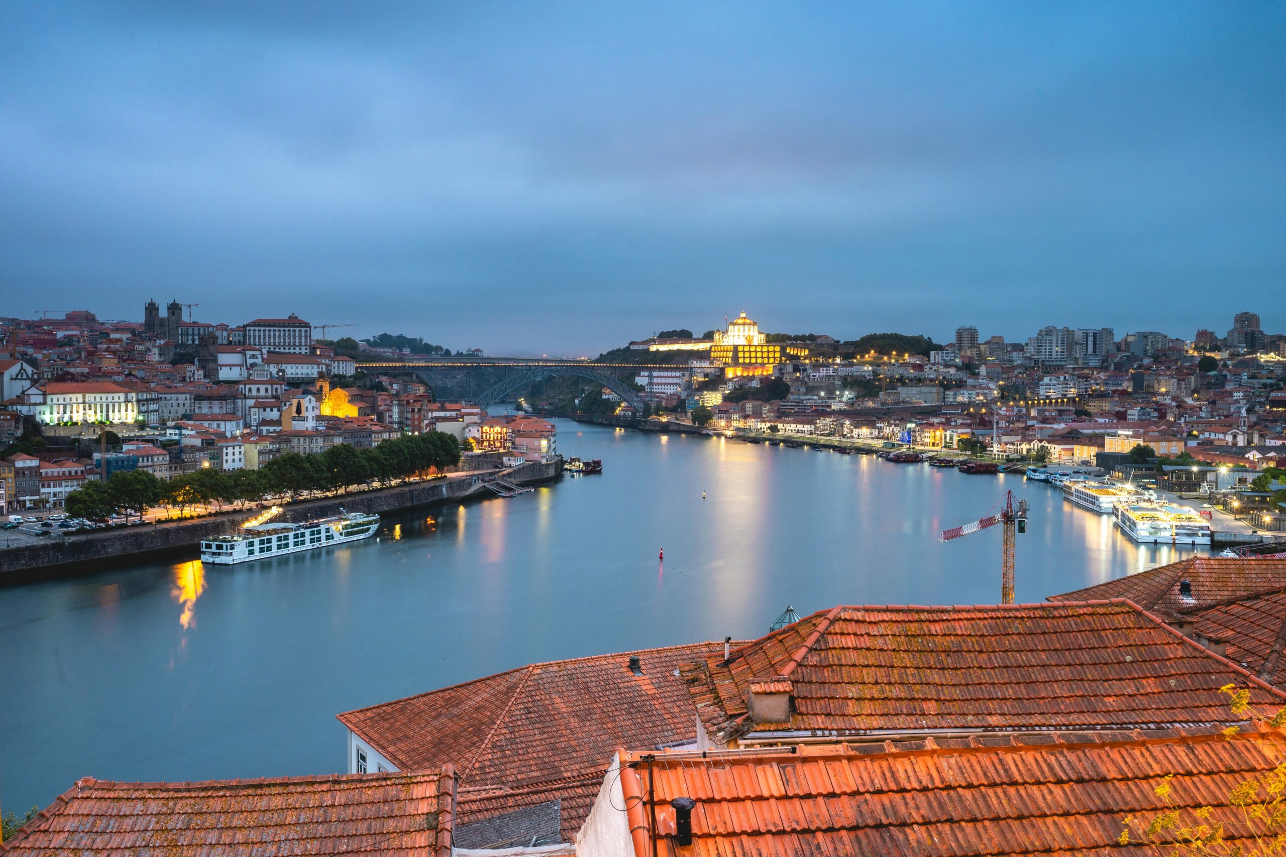 Top 12 Undiscovered River Cruises to Unveil Hidden Worlds Stunning view of Porto cityscape and Douro River at twilight, highlighting Portugal
