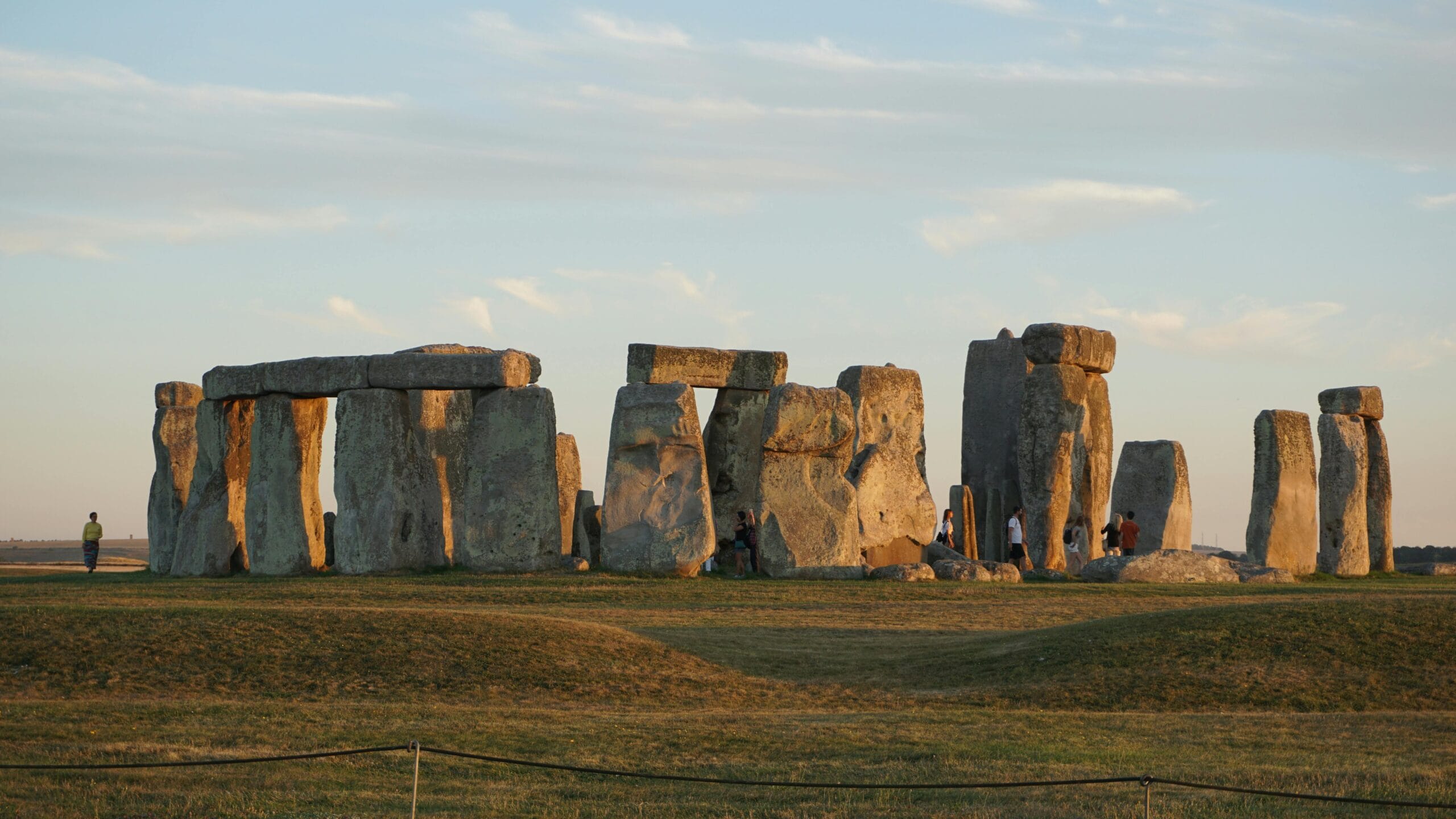 Stonehenge under evening sky in England, capturing ancient mystery.