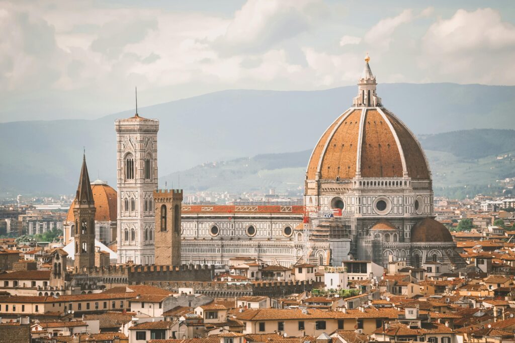 Top 10 Destinations in Italy A breathtaking view of Florence Cathedral, also known as Il Duomo, with the cityscape at dawn.